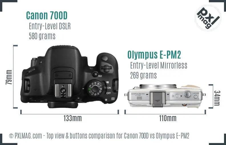 Canon 700D vs Olympus E-PM2 top view buttons comparison