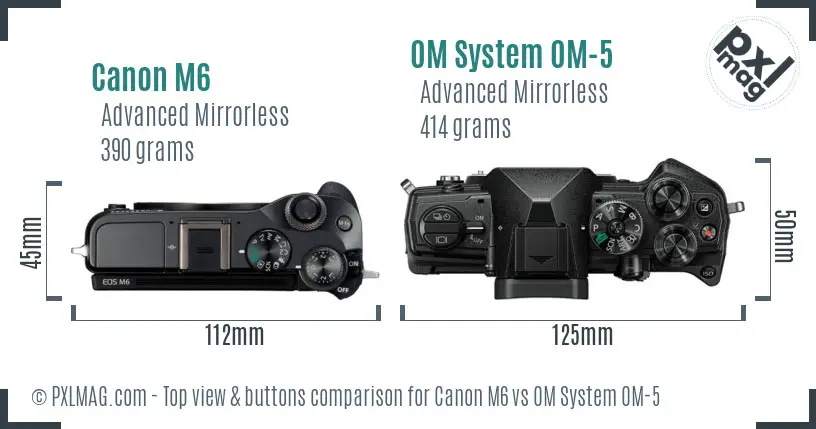 Canon M6 vs OM System OM-5 top view buttons comparison Canon M6 vs OM System OM-5 top view buttons comparison