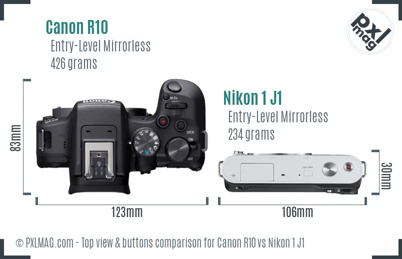 Canon R10 vs Nikon 1 J1 top view buttons comparison