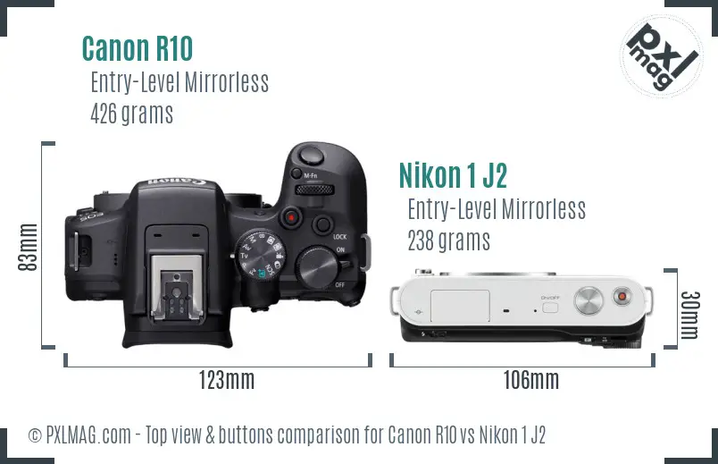 Canon R10 vs Nikon 1 J2 top view buttons comparison