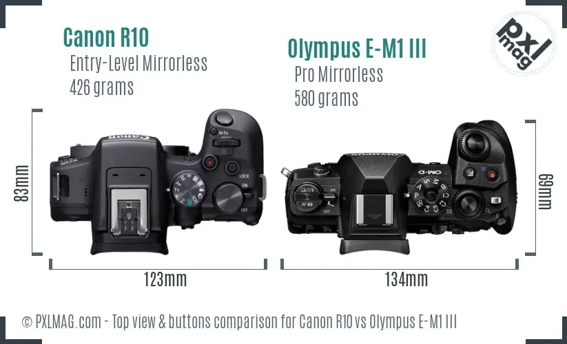 Canon R10 vs Olympus E-M1 III top view buttons comparison