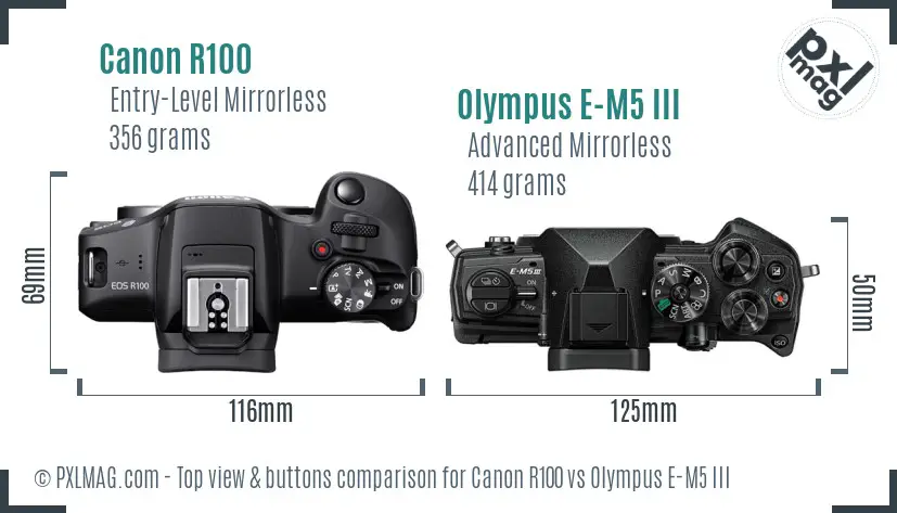 Canon R100 vs Olympus E-M5 III top view buttons comparison Canon R100 vs Olympus E-M5 III top view buttons comparison