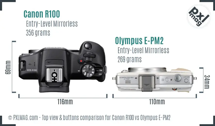 Canon R100 vs Olympus E-PM2 top view buttons comparison