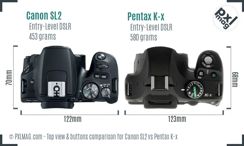Canon SL2 vs Pentax K-x top view buttons comparison