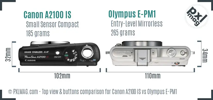 Canon A2100 IS vs Olympus E-PM1 top view buttons comparison