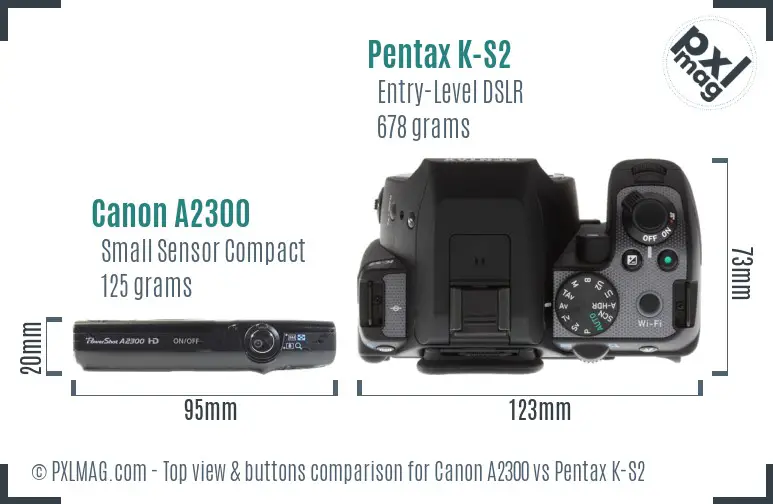 Canon A2300 vs Pentax K-S2 top view buttons comparison