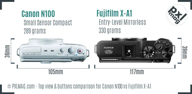 Canon N100 vs Fujifilm X-A1 top view buttons comparison