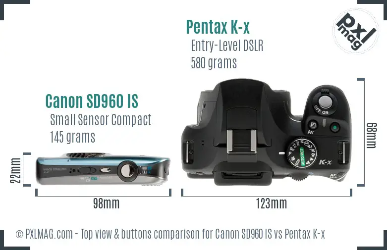 Canon SD960 IS vs Pentax K-x top view buttons comparison