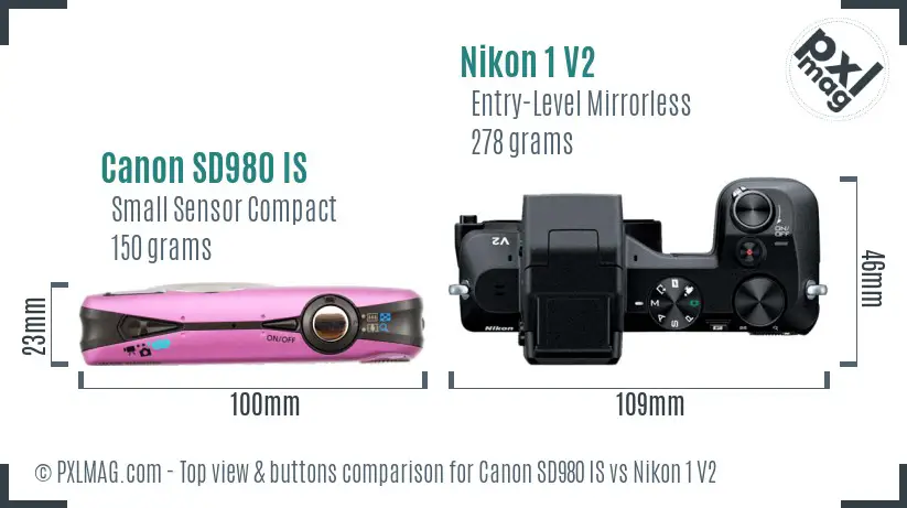 Canon SD980 IS vs Nikon 1 V2 top view buttons comparison