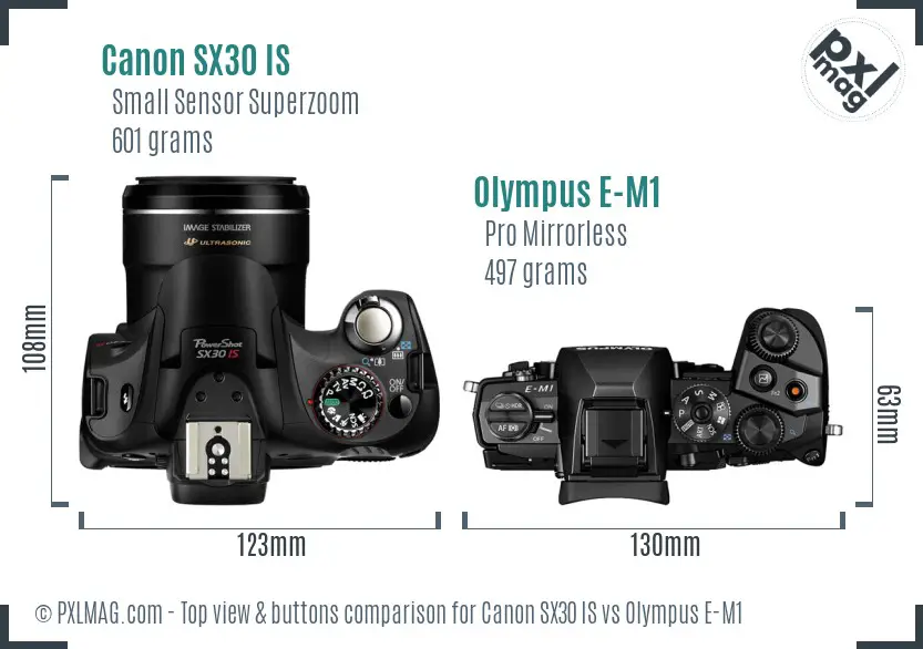 Canon SX30 IS vs Olympus E-M1 top view buttons comparison