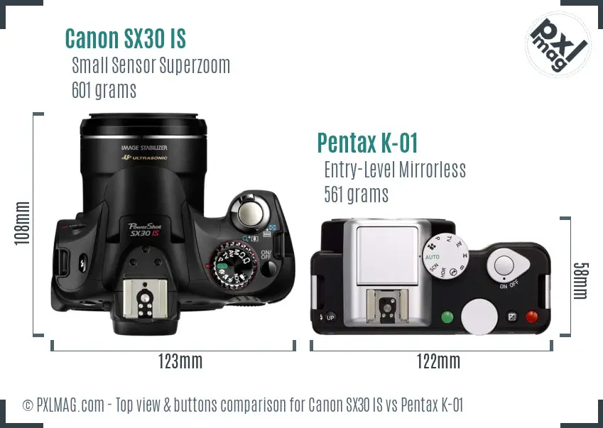 Canon SX30 IS vs Pentax K-01 top view buttons comparison
