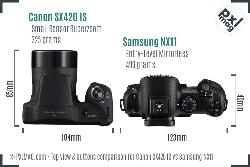 Canon SX420 IS vs Samsung NX11 top view buttons comparison
