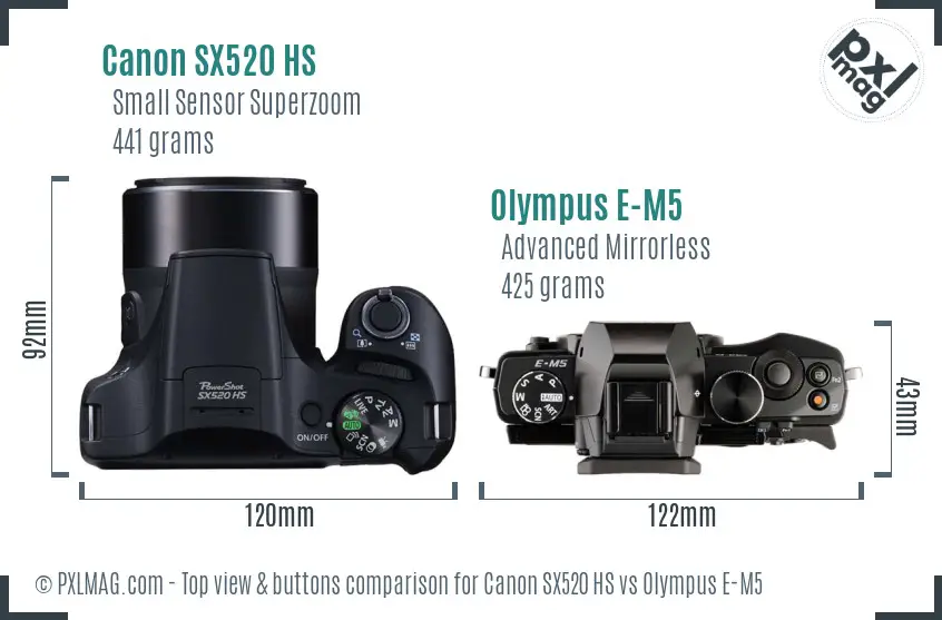 Canon SX520 HS vs Olympus E-M5 top view buttons comparison