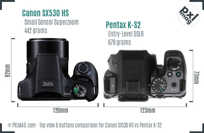 Canon SX530 HS vs Pentax K-S2 top view buttons comparison