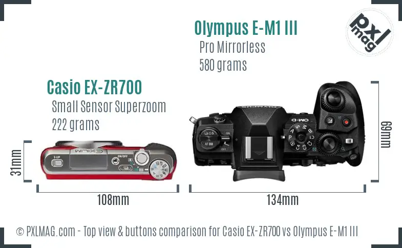 Casio EX-ZR700 vs Olympus E-M1 III top view buttons comparison