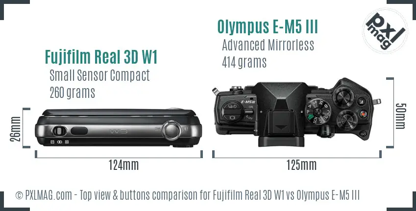 Fujifilm Real 3D W1 vs Olympus E-M5 III top view buttons comparison