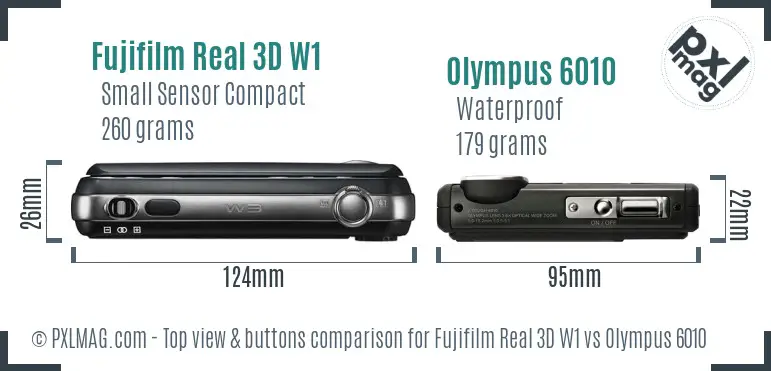 Fujifilm Real 3D W1 vs Olympus 6010 top view buttons comparison Fujifilm Real 3D W1 vs Olympus 6010 top view buttons comparison