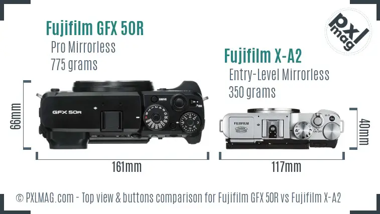 Fujifilm GFX 50R vs Fujifilm X-A2 top view buttons comparison Fujifilm GFX 50R vs Fujifilm X-A2 top view buttons comparison