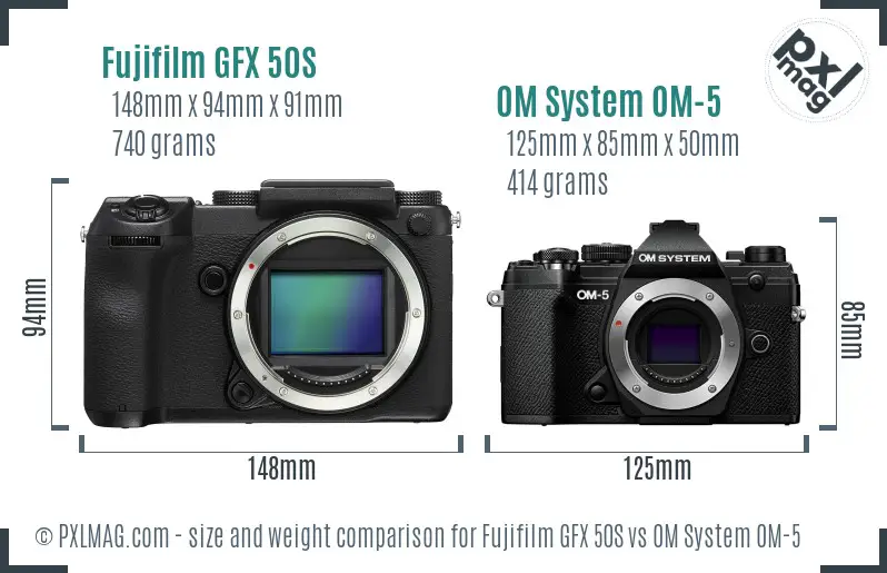 Fujifilm GFX 50S vs OM System OM-5 size comparison