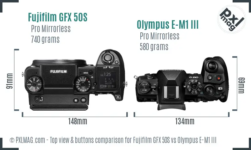 Fujifilm GFX 50S vs Olympus E-M1 III top view buttons comparison