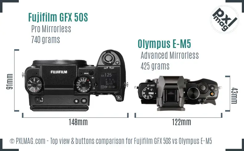 Fujifilm GFX 50S vs Olympus E-M5 top view buttons comparison