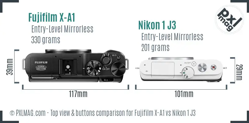 Fujifilm X-A1 vs Nikon 1 J3 top view buttons comparison