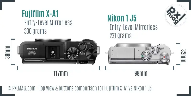 Fujifilm X-A1 vs Nikon 1 J5 top view buttons comparison