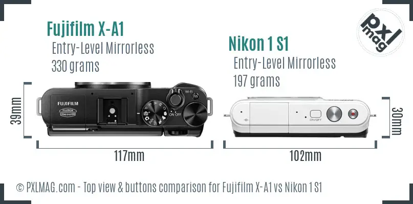 Fujifilm X-A1 vs Nikon 1 S1 top view buttons comparison