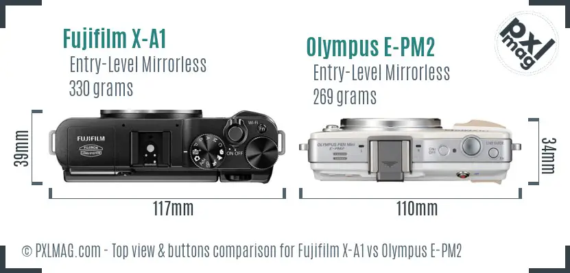 Fujifilm X-A1 vs Olympus E-PM2 top view buttons comparison