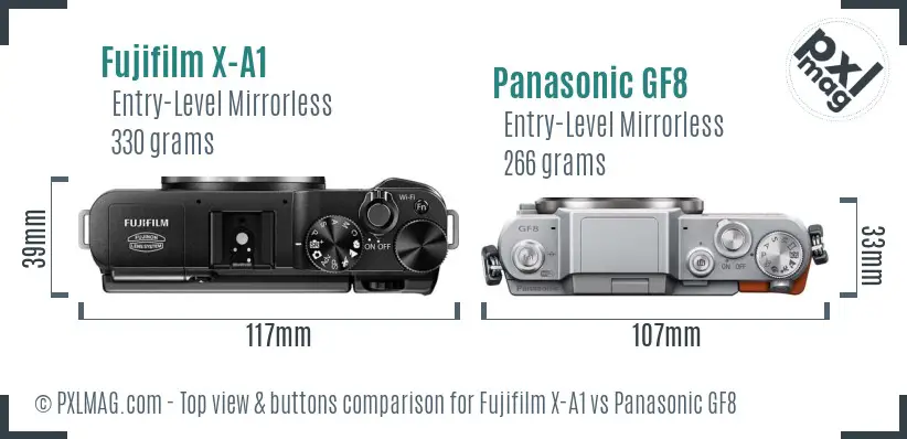Fujifilm X-A1 vs Panasonic GF8 top view buttons comparison Fujifilm X-A1 vs Panasonic GF8 top view buttons comparison