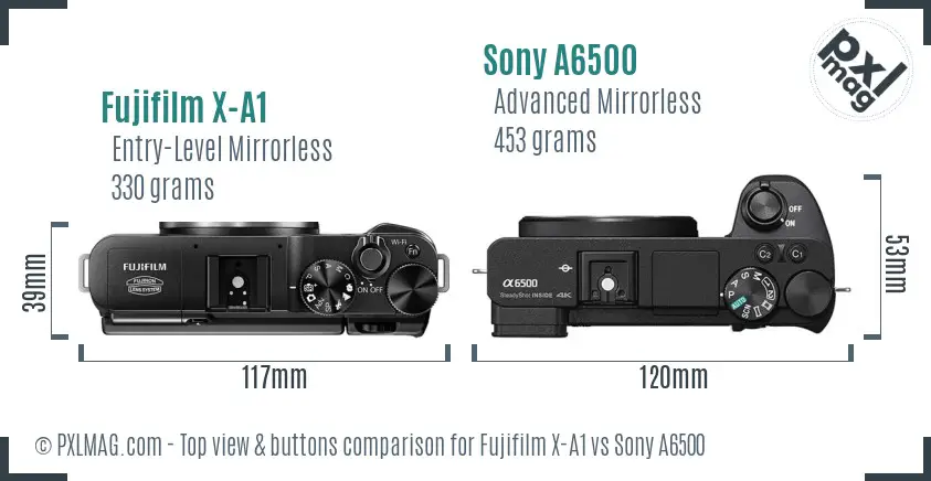 Fujifilm X-A1 vs Sony A6500 top view buttons comparison