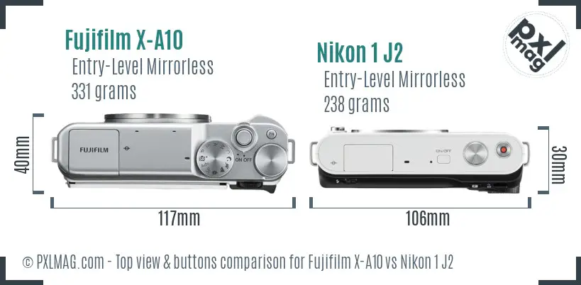 Fujifilm X-A10 vs Nikon 1 J2 top view buttons comparison