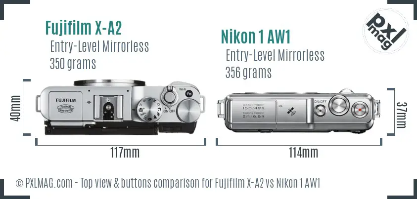 Fujifilm X-A2 vs Nikon 1 AW1 top view buttons comparison