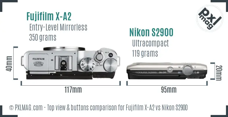 Fujifilm X-A2 vs Nikon S2900 top view buttons comparison