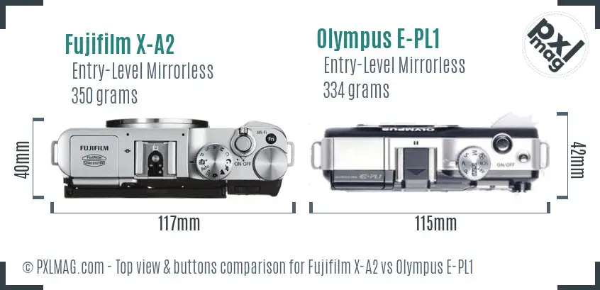 Fujifilm X-A2 vs Olympus E-PL1 top view buttons comparison