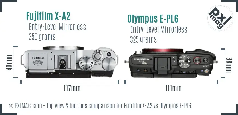 Fujifilm X-A2 vs Olympus E-PL6 top view buttons comparison