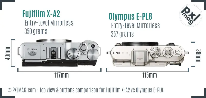 Fujifilm X-A2 vs Olympus E-PL8 top view buttons comparison