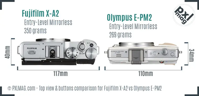 Fujifilm X-A2 vs Olympus E-PM2 top view buttons comparison