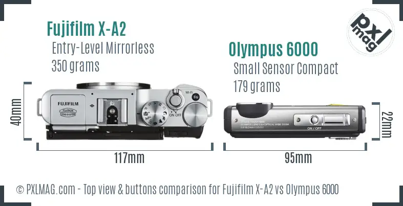 Fujifilm X-A2 vs Olympus 6000 top view buttons comparison