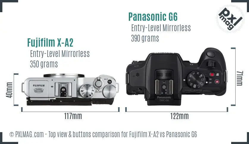 Fujifilm X-A2 vs Panasonic G6 top view buttons comparison