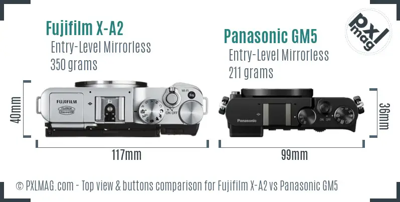 Fujifilm X-A2 vs Panasonic GM5 top view buttons comparison Fujifilm X-A2 vs Panasonic GM5 top view buttons comparison
