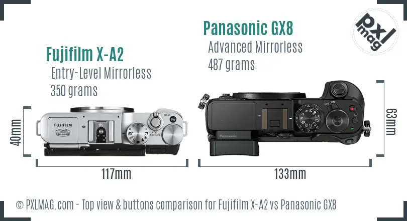 Fujifilm X-A2 vs Panasonic GX8 top view buttons comparison