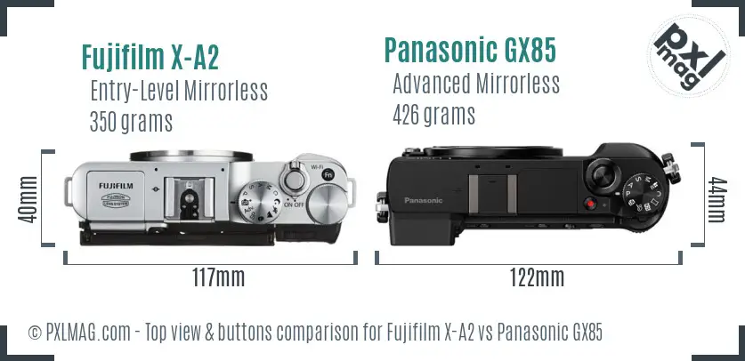 Fujifilm X-A2 vs Panasonic GX85 top view buttons comparison