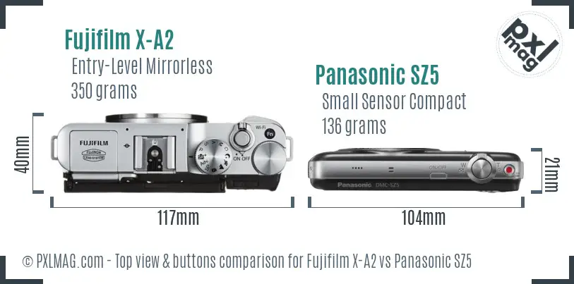 Fujifilm X-A2 vs Panasonic SZ5 top view buttons comparison
