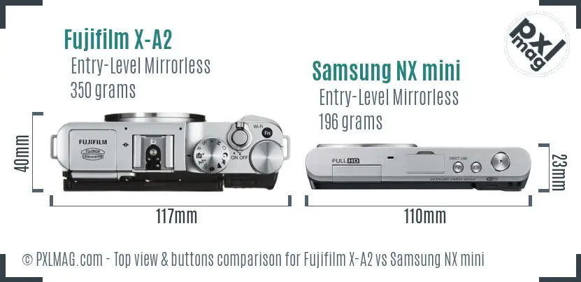 Fujifilm X-A2 vs Samsung NX mini top view buttons comparison