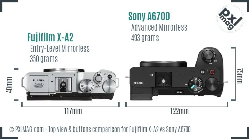 Fujifilm X-A2 vs Sony A6700 top view buttons comparison