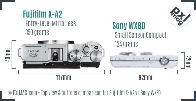 Fujifilm X-A2 vs Sony WX80 top view buttons comparison