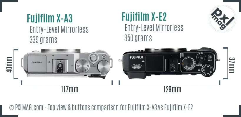 Fujifilm X-A3 vs Fujifilm X-E2 top view buttons comparison