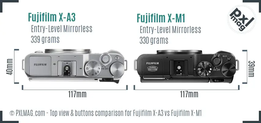Fujifilm X-A3 vs Fujifilm X-M1 top view buttons comparison