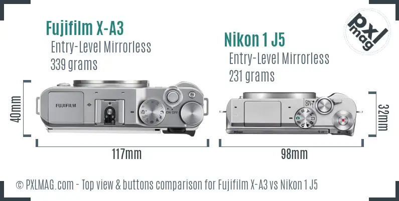 Fujifilm X-A3 vs Nikon 1 J5 top view buttons comparison